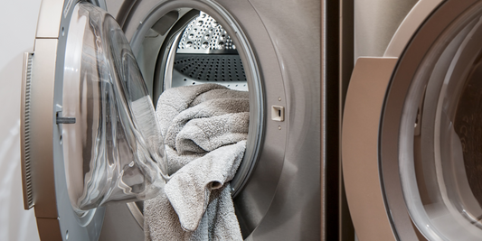 The Gross Reason Experts Say You Should Never Wash Towels and Sheets Together